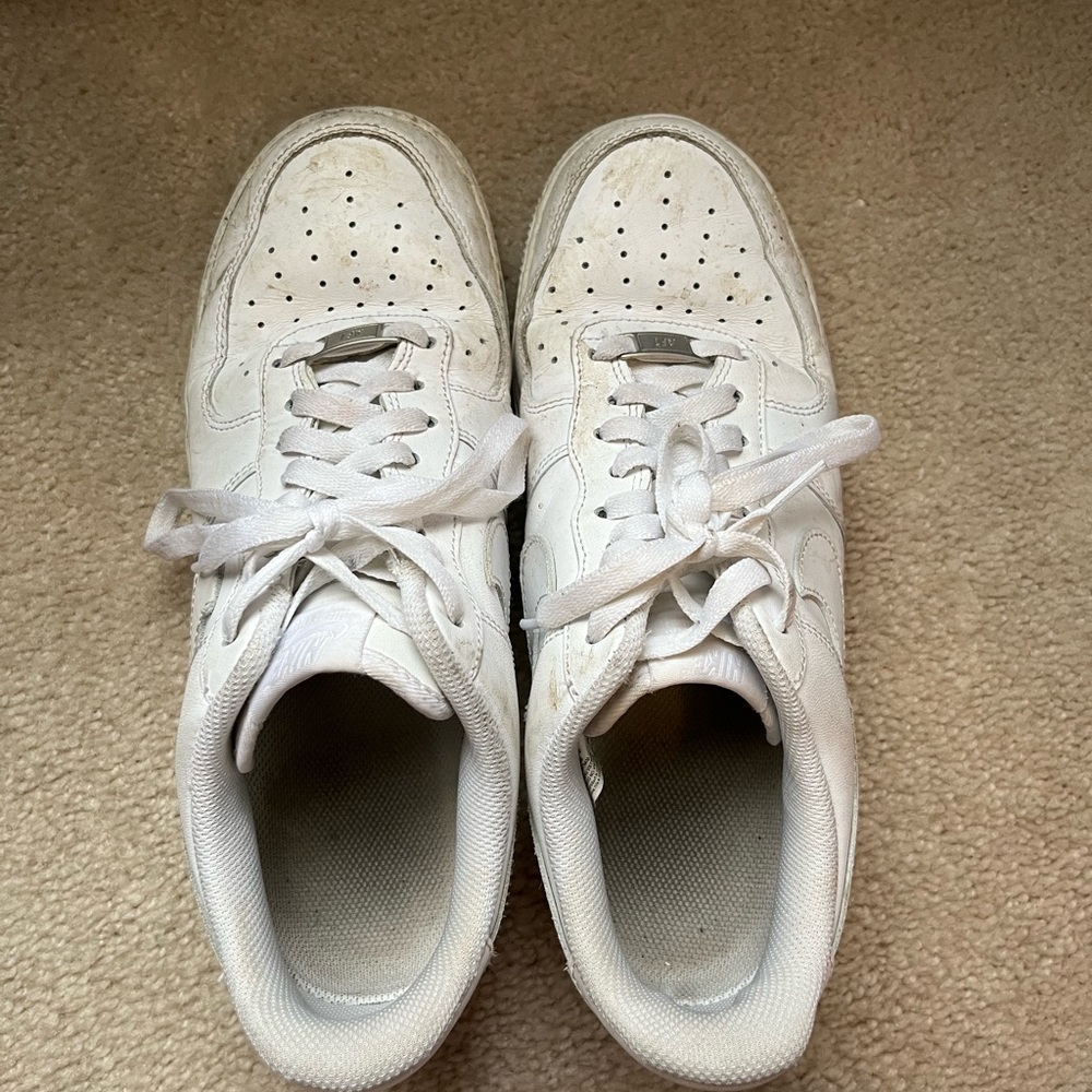 Pretty worn pair of Air Force 1’s. Womens size 11 Mens size 9